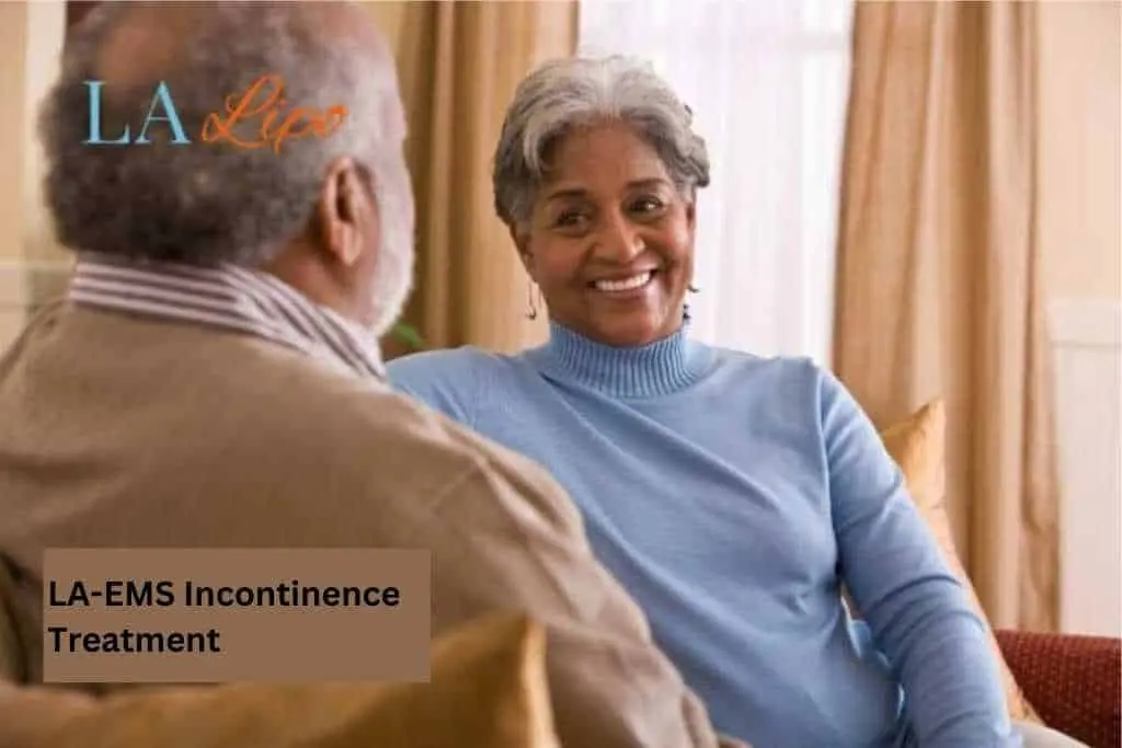Couple sat smiling at each other - LA-EMS treatment Apsley